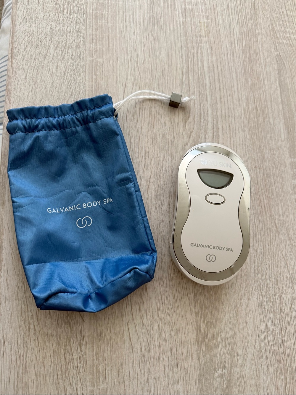 Galvanic Body Spa Handheld Device with Blue Pouch